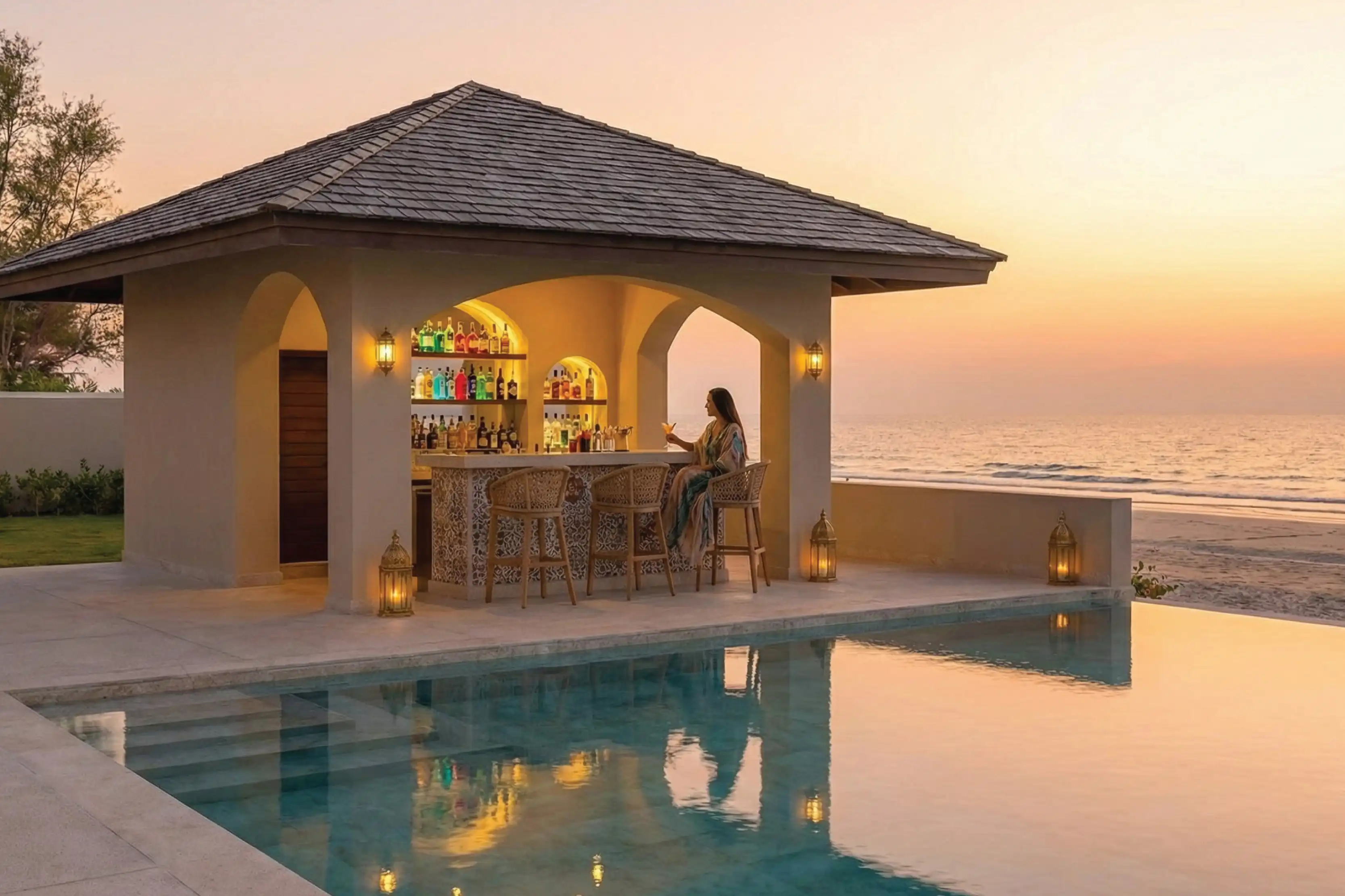 Beach bar pavilion beside the pool at dusk